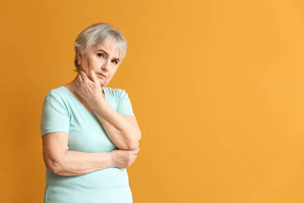 Elderly Woman Suffering Mental Disability Color Background — Stock Photo, Image