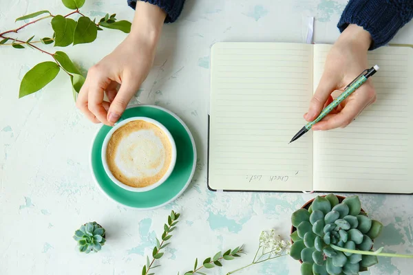 Woman Writing Notebook Drinking Coffee Table Top View — Stock Photo, Image