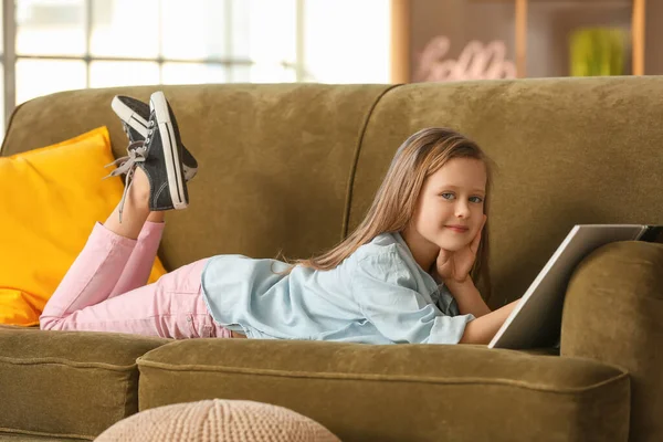 Cute Little Girl Reading Book Sofa Home — Stock Photo, Image