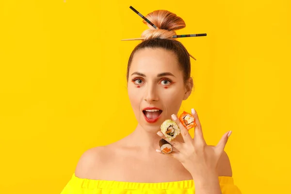 Beautiful Woman Tasty Sushi Color Background — Stock Photo, Image