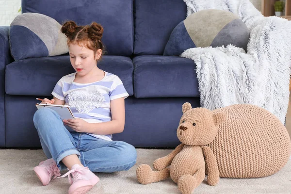 Cute Little Girl Writing Notebook Home — Stock Photo, Image