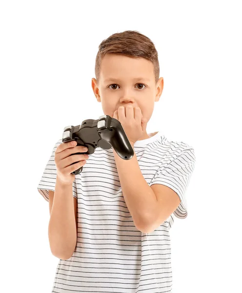 可爱的小男孩在白色背景下玩电子游戏 — 图库照片