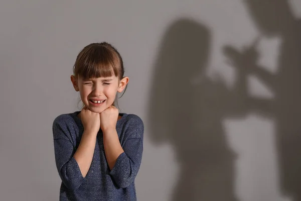 Afraid Little Girl Shadow Her Quarreling Parents Grey Background — Stock Photo, Image