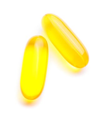 Beyaz arkaplanda balık yağı kapsülleri