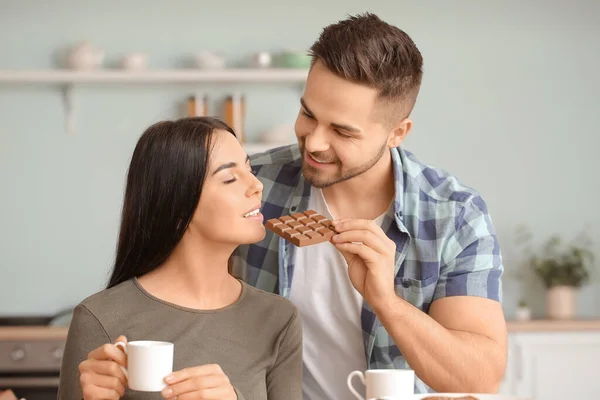 Beautiful Young Couple Eating Chocolate Kitchen — Stock Photo, Image