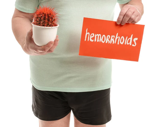 Elderly Man Holding Cactus Paper Text Hemorrhoids White Background — Stock Photo, Image