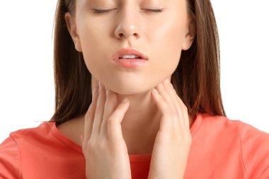 Young woman checking thyroid gland on white background, closeup clipart