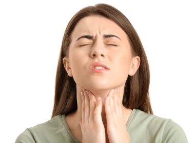 Young woman checking thyroid gland on white background clipart