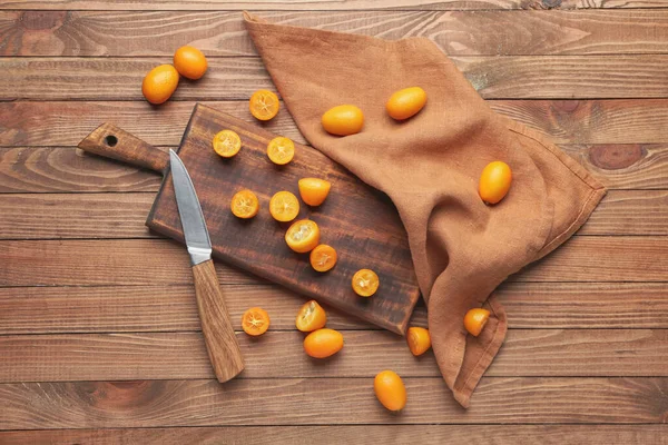 Board Tasty Kumquat Fruit Knife Wooden Background — Stock Photo, Image