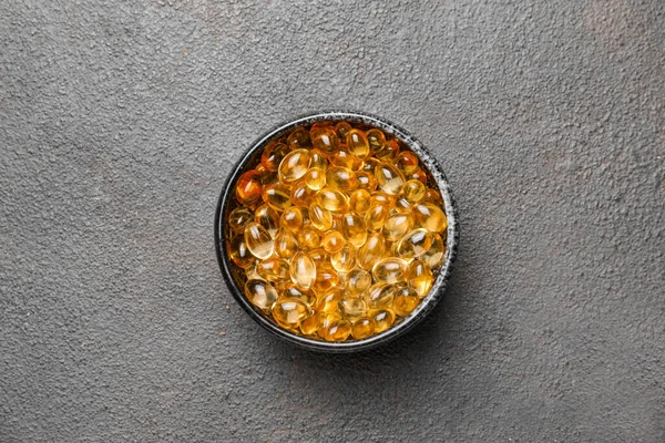 Bowl Fish Oil Capsules Grey Background — Stock Photo, Image