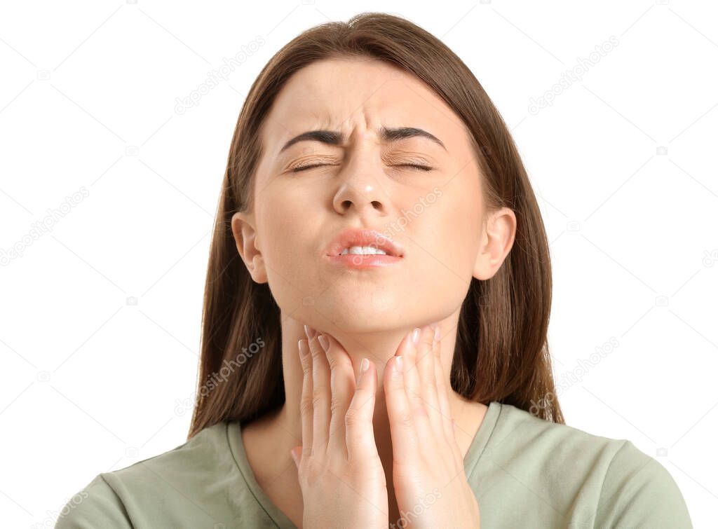 Young woman checking thyroid gland on white background