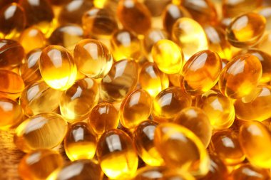 Arkaplan olarak balık yağı kapsülleri