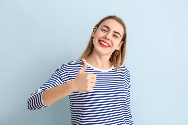 Beautiful Young Woman Showing Thumb Color Background — Stock Photo, Image