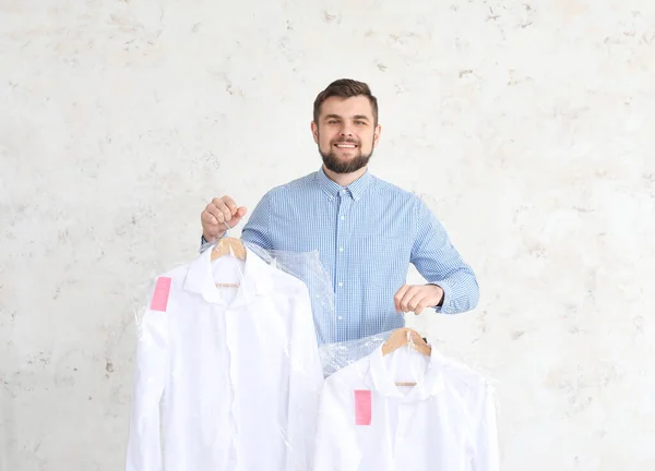Worker Modern Dry Cleaner Light Background — Stock Photo, Image