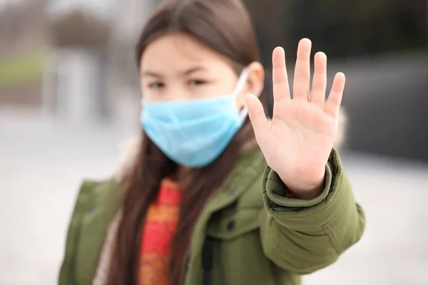 Little Asian Girl Protective Mask Showing Stop Gesture City Street — Stock Photo, Image