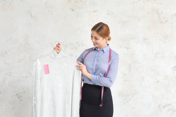 Worker Modern Dry Cleaner Light Background — Stock Photo, Image