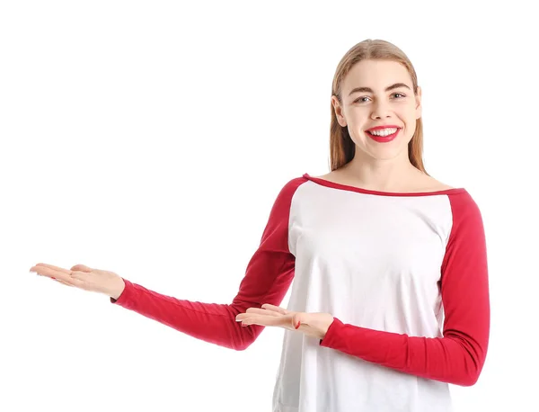 Beautiful Young Woman Showing Something White Background — Stock Photo, Image