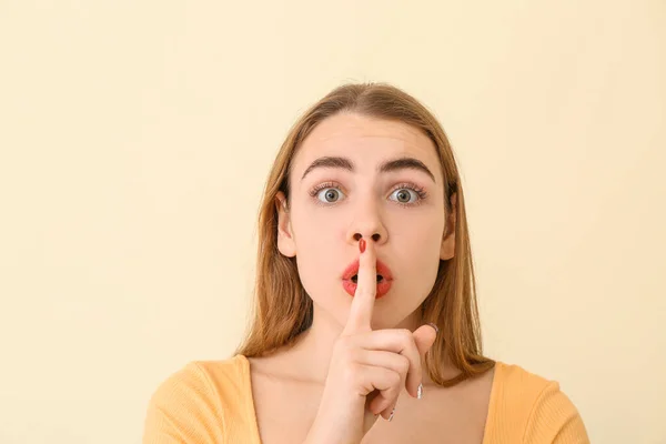 Beautiful Young Woman Showing Silence Gesture Color Background — Stock Photo, Image