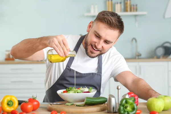 Handsome Male Chef Dressing Salad Kitchen — Stock Photo, Image