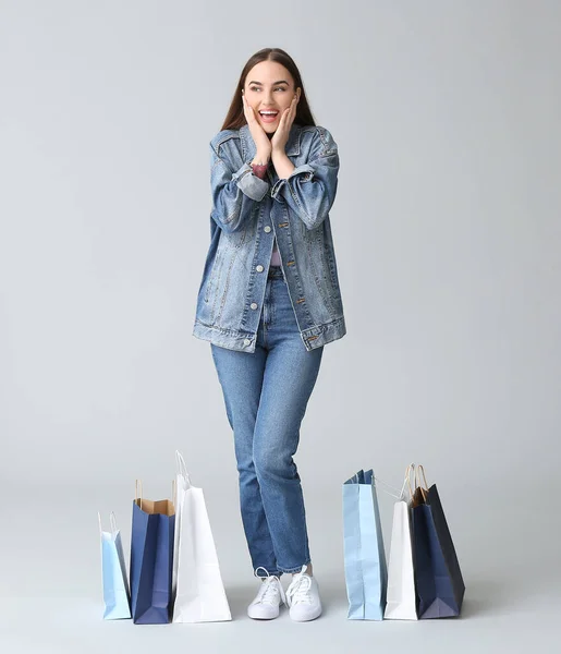 Happy Young Woman Shopping Bags Grey Background — Stock Photo, Image