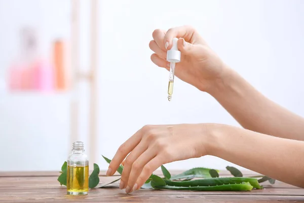 Woman Applying Essential Oil Her Hands — Stock Photo, Image