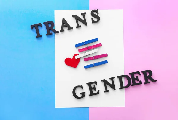 Folha Papel Com Pinos Texto Trans Gender Sobre Fundo Cor — Fotografia de Stock