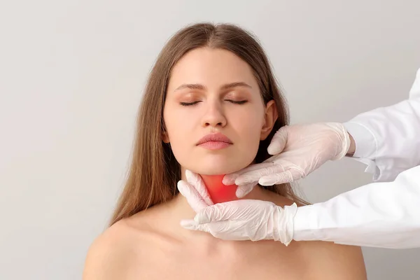 Endocrinologist Examining Young Woman Thyroid Gland Problem Light Background — Stock Photo, Image