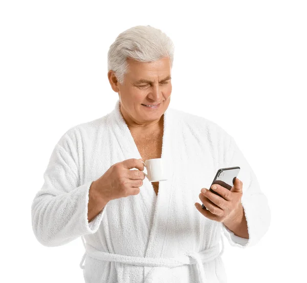 Mature Man Bathrobe Mobile Phone Cup Coffee White Background — Stock Photo, Image