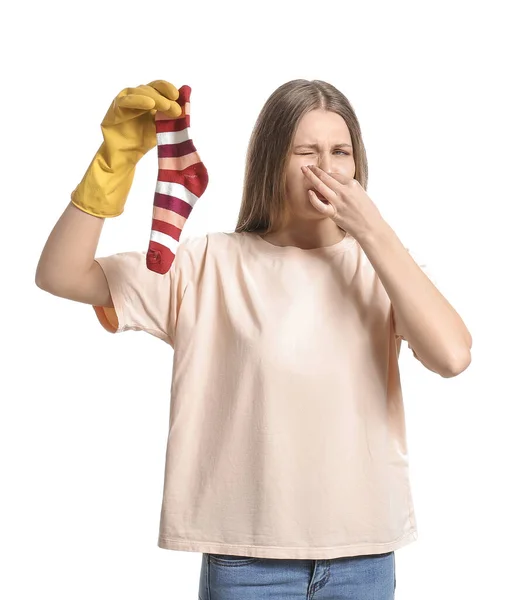 Mujer Disgustada Con Calcetines Sucios Sobre Fondo Blanco —  Fotos de Stock