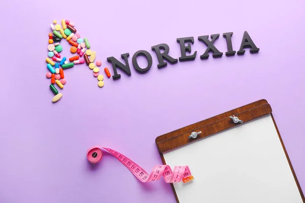 Word Anorexia Pills Clipboard Measuring Tape Color Background — Stock Photo, Image