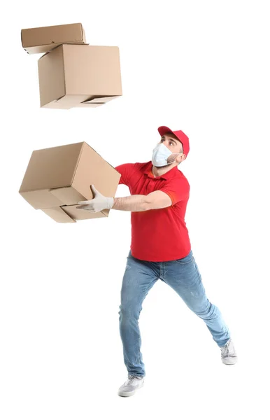 Male Courier Medical Mask Dropping Boxes White Background — Stock Photo, Image