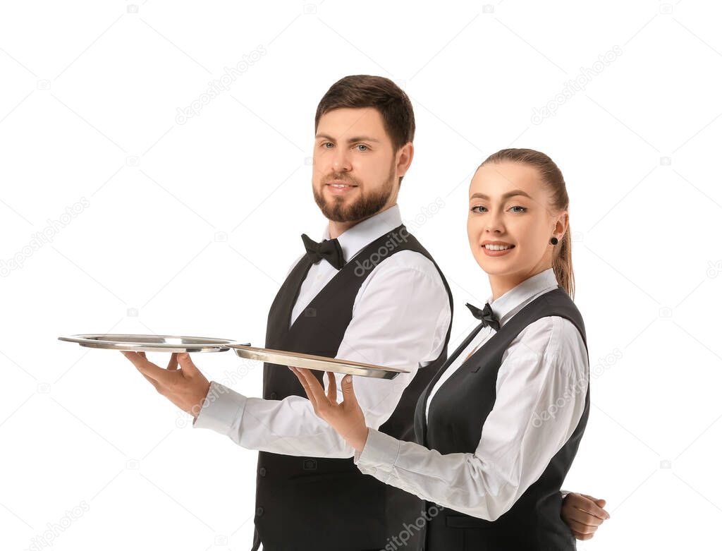 Male and female waiters on white background