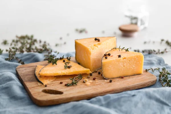 Wooden Board Tasty Cheese Thyme Spices Table — Stock Photo, Image