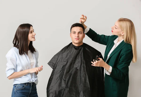 Young Hairdressers Working Client Light Background — Stock Photo, Image