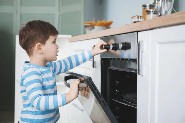 Little Boy Playing Electric Oven Home — Stock Photo, Image