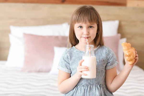 Little Girl Drinking Milk Croissant Bedroom — Stock Photo, Image