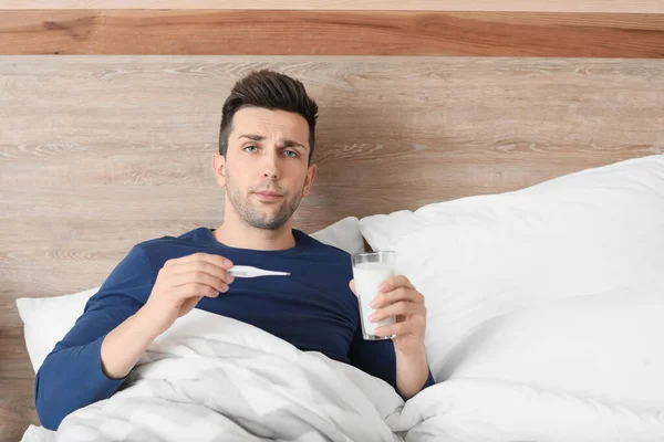 Young Man Ill Flu Drinking Milk Bed — Stock Photo, Image