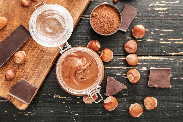 Jar Tasty Chocolate Paste Hazelnuts Table — Stock Photo, Image