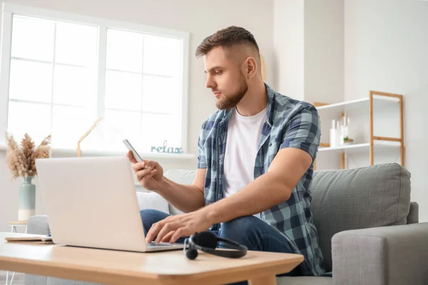 Male technical support agent working at home