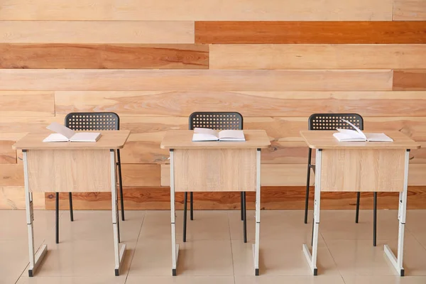 Modern School Desks Wooden Wall — Stock Photo, Image