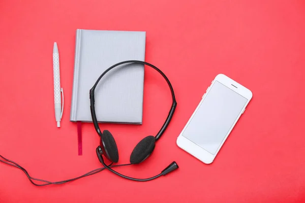Mobile Phone Headset Notebook Color Background — Stock Photo, Image