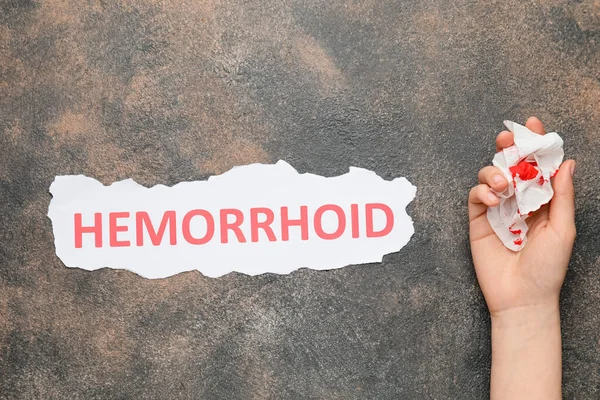 Female Hand Blood Stained Toilet Paper Word Hemorrhoid Grey Background — Stock Photo, Image