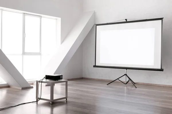 Room with projector prepared for conference in office