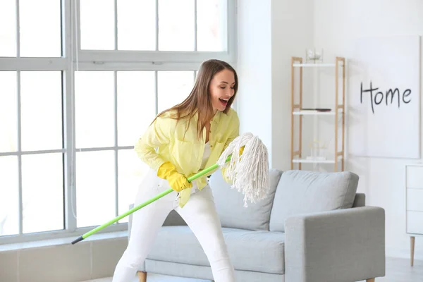 Young Woman Having Fun While Mopping Floor Room — Stock Photo, Image