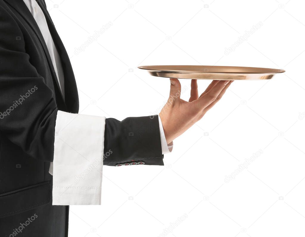 Handsome male waiter with empty tray on white background