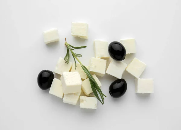 Tasty Cut Feta Cheese Olives Herbs White Background — Stock Photo, Image