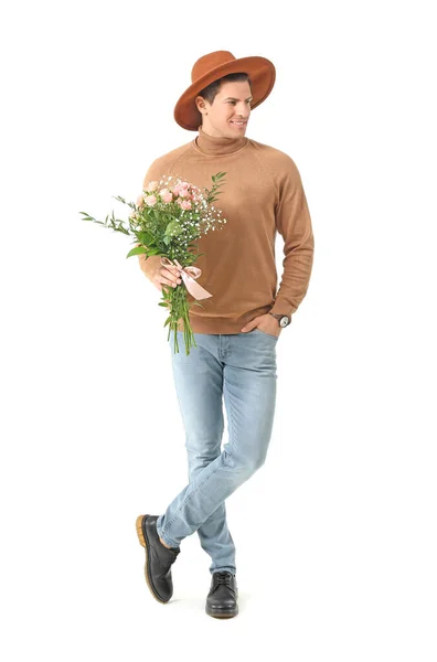 白い背景に花の花束を持つハンサムな男 — ストック写真