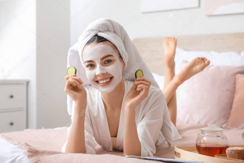 Morning of beautiful young woman taking care of her skin at home