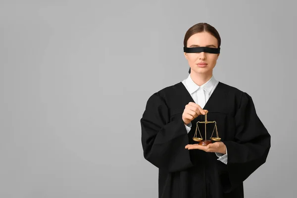 Female Blindfolded Judge Light Background — Stock Photo, Image