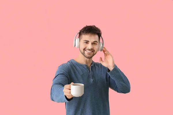 Young Man Cup Hot Coffee Listening Music Color Background — Stock Photo, Image